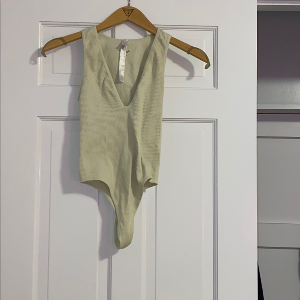 lime green body suit from urban outfitters !!